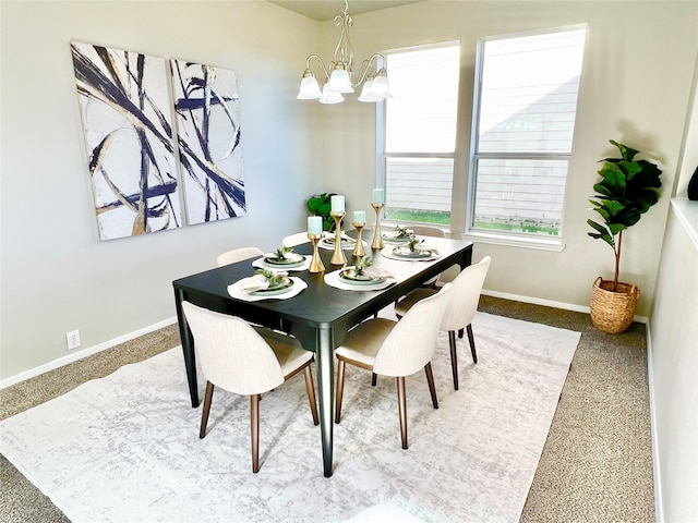 carpeted dining space featuring an inviting chandelier