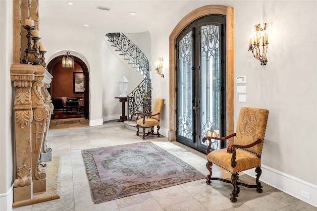 entrance foyer featuring french doors