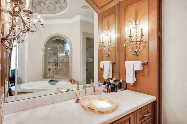 bathroom with vanity and ornamental molding