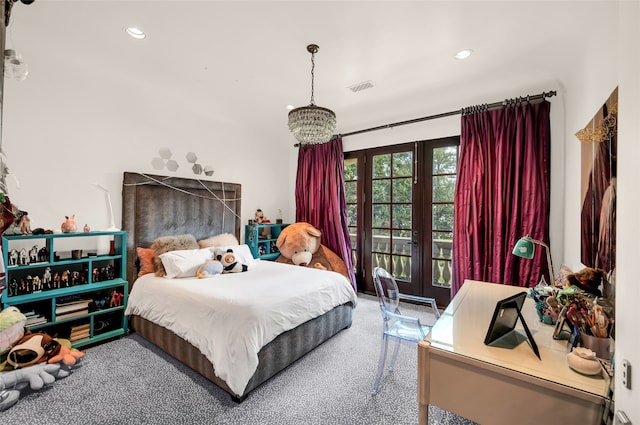 carpeted bedroom featuring french doors