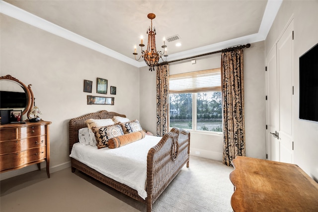 carpeted bedroom with a chandelier