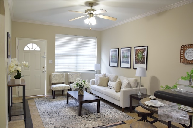 living room featuring tile patterned flooring, ceiling fan, and ornamental molding