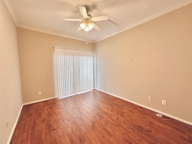 empty room featuring hardwood / wood-style flooring, ceiling fan, and crown molding