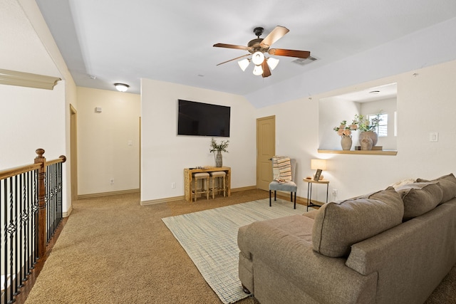 living room with carpet flooring and ceiling fan