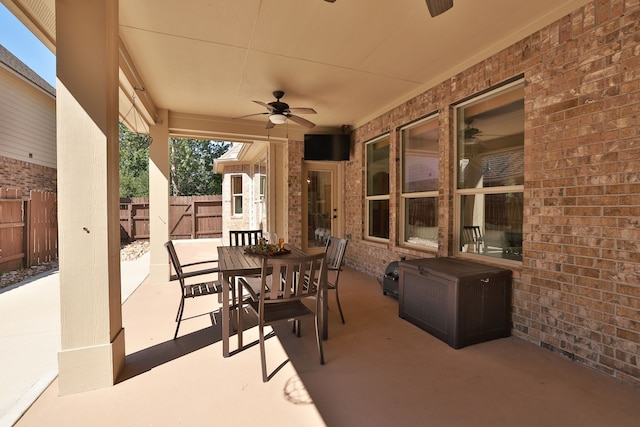 view of patio / terrace featuring ceiling fan