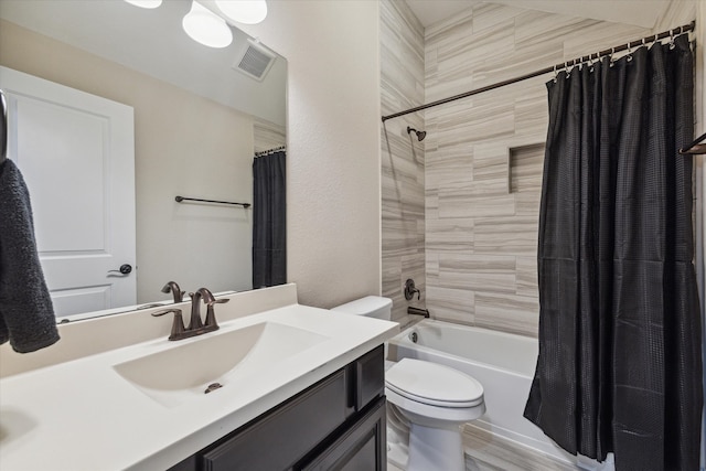 full bathroom with hardwood / wood-style floors, shower / bath combination with curtain, toilet, and vanity