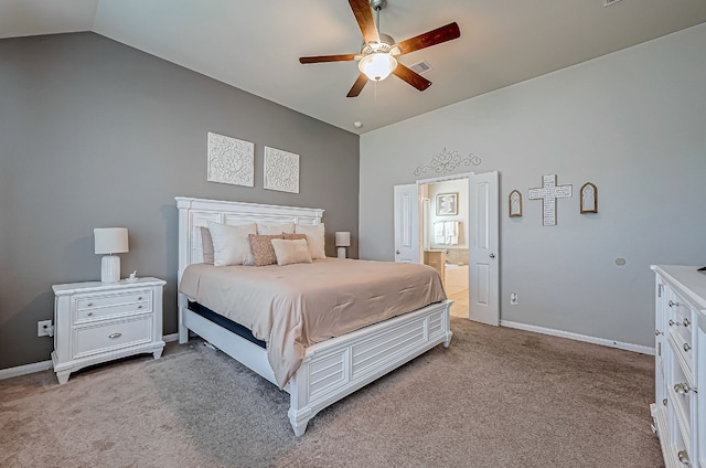 carpeted bedroom featuring connected bathroom, ceiling fan, and lofted ceiling