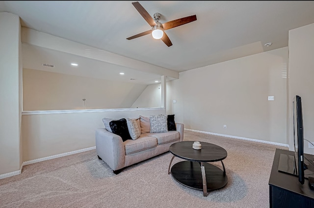 living room featuring light carpet, vaulted ceiling, and ceiling fan