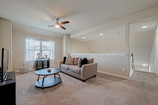 living room with carpet and ceiling fan