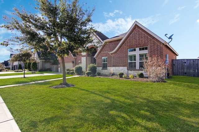 view of front of home with a front yard