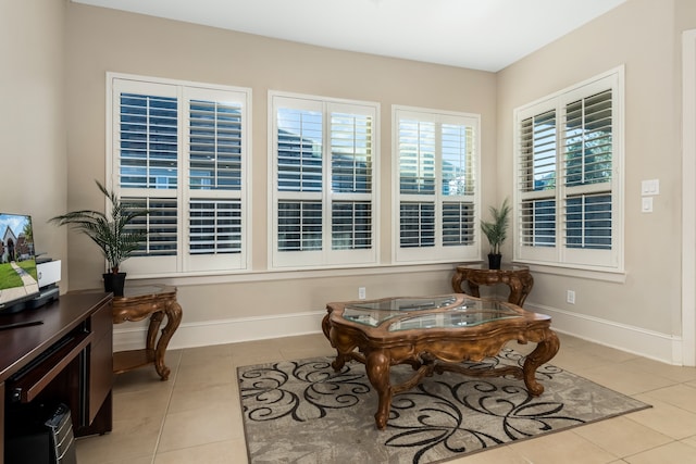 sitting room featuring light tile patterned floors