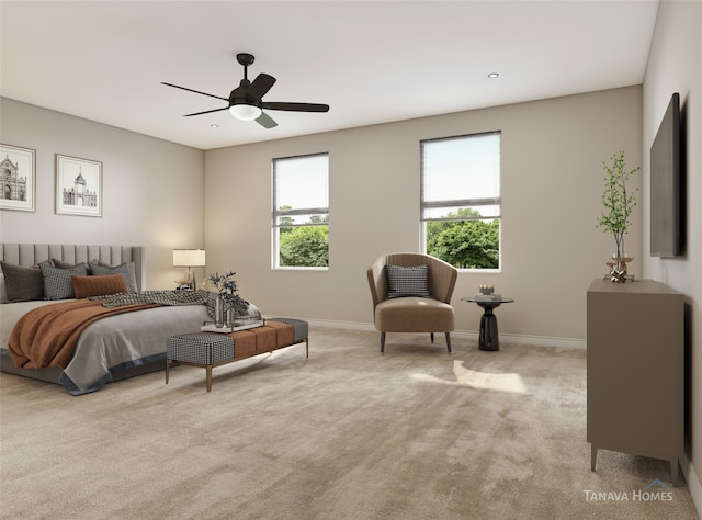 bedroom featuring ceiling fan and light carpet