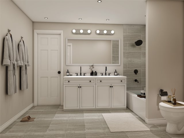 full bathroom with vanity, tiled shower / bath combo, and toilet