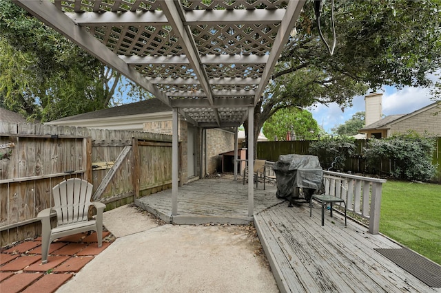 deck with a grill and a pergola