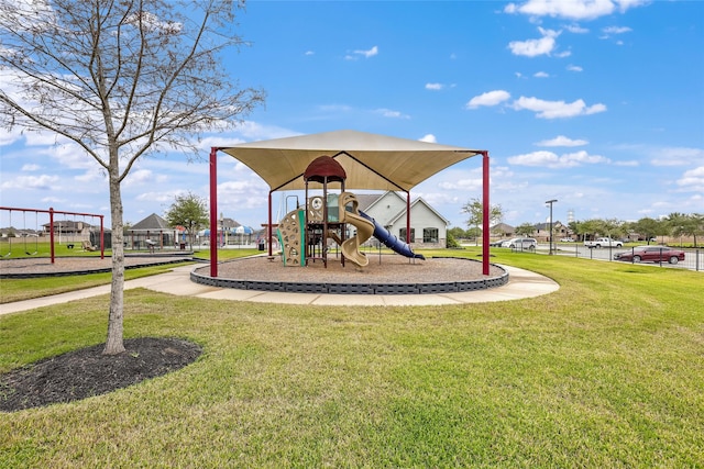 view of playground with a yard