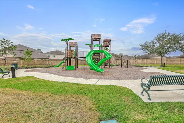 view of playground with a yard