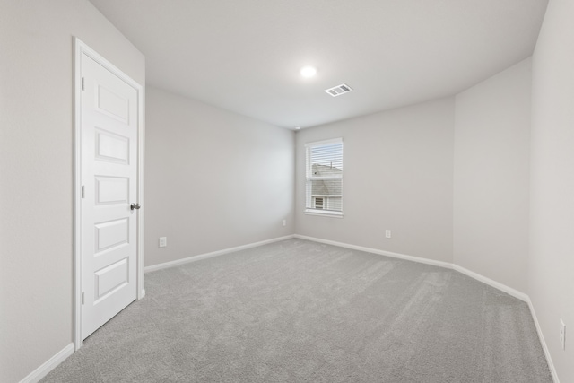 empty room featuring carpet flooring