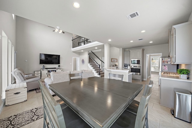 dining area with ceiling fan