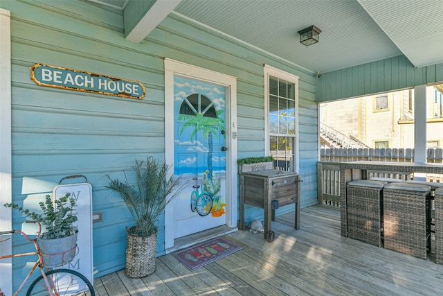 entrance to property with a porch