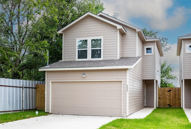 front of property featuring a garage