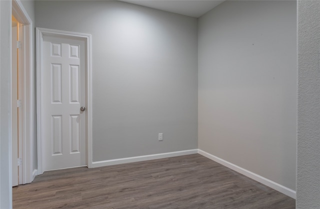 spare room featuring hardwood / wood-style flooring