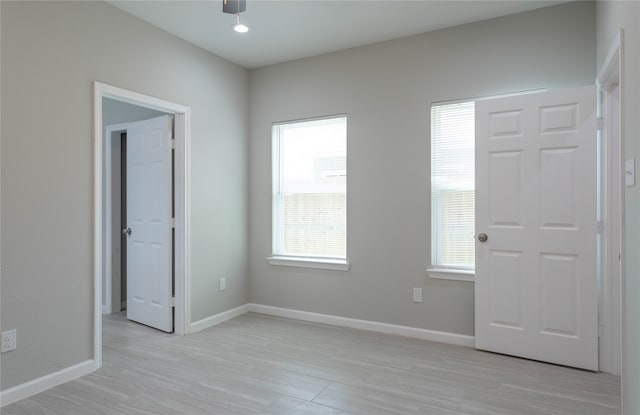 foyer featuring light hardwood / wood-style flooring and plenty of natural light