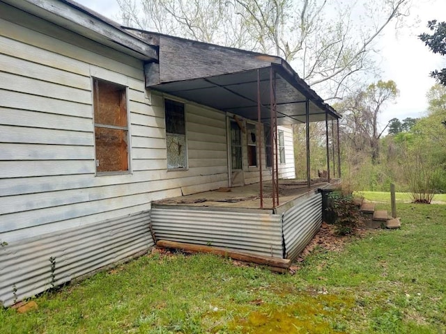 view of home's exterior featuring a yard