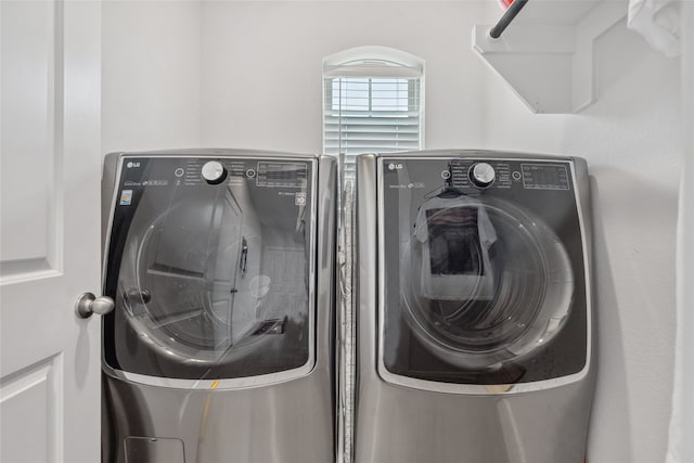 laundry area featuring washer and clothes dryer