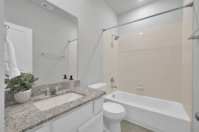 full bathroom with shower / washtub combination, vanity, and toilet