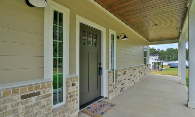 property entrance with a porch