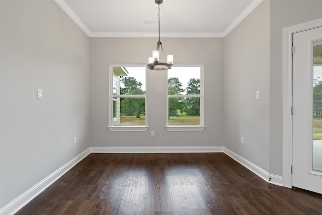 unfurnished dining area featuring a notable chandelier, dark hardwood / wood-style flooring, and crown molding