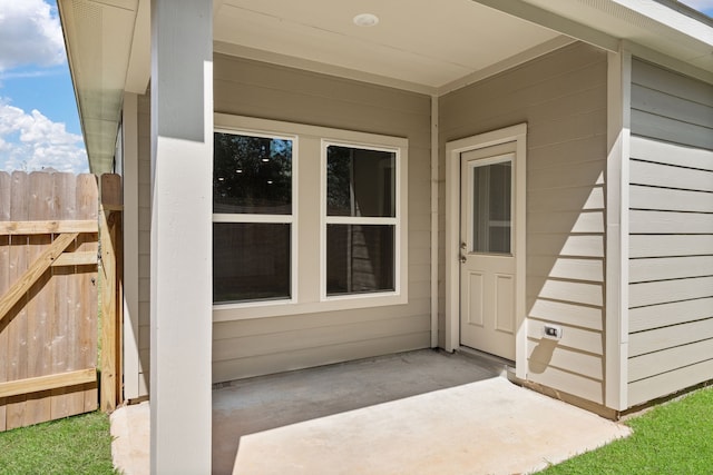 entrance to property with a patio area