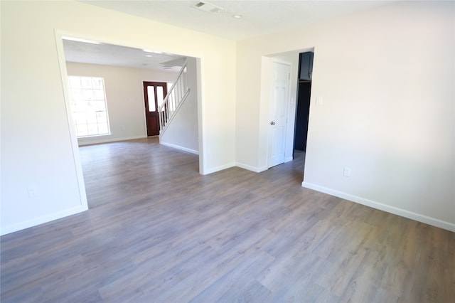 empty room featuring hardwood / wood-style flooring