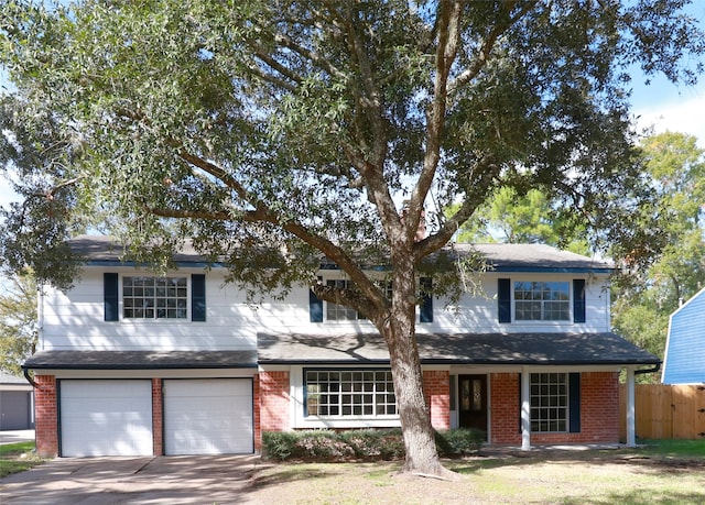 front facade with a garage