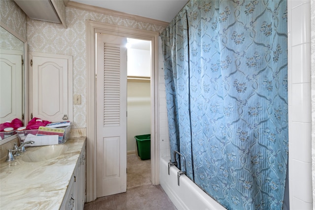 bathroom featuring vanity, shower / bath combination with curtain, and crown molding