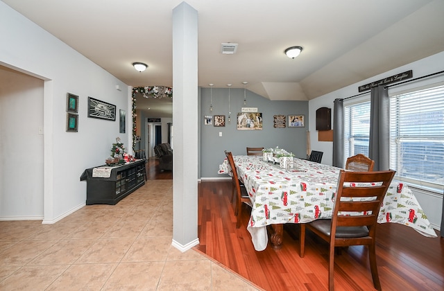 dining area featuring light wood-type flooring