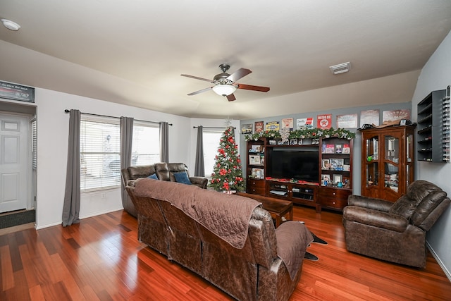 living room featuring ceiling fan and wood-type flooring