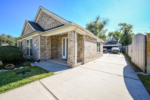 view of side of property with a garage