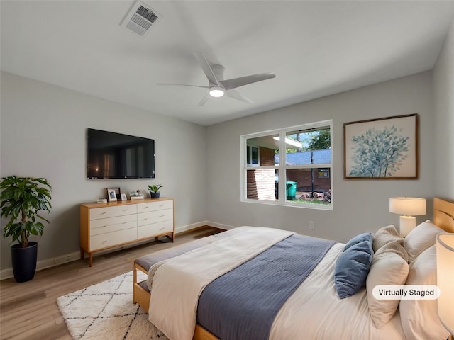 bedroom featuring ceiling fan and light wood-type flooring