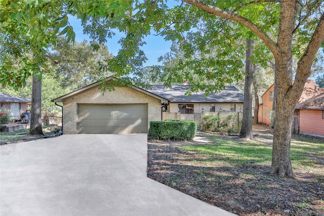 ranch-style home with a garage