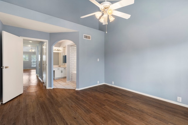 empty room with ceiling fan and light wood-type flooring