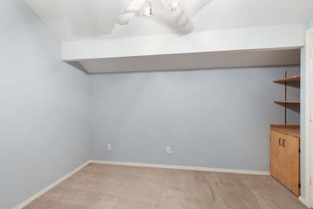 basement with light colored carpet