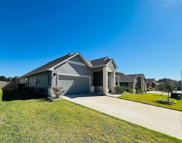 ranch-style house with a front yard and a garage