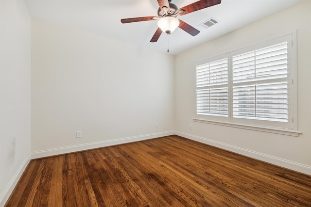 spare room with hardwood / wood-style flooring and ceiling fan