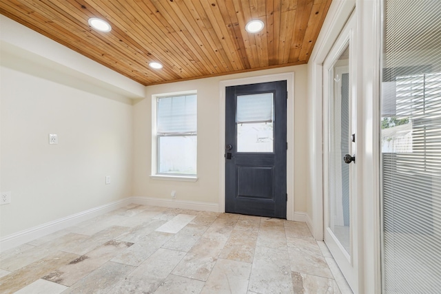 doorway to outside featuring wooden ceiling