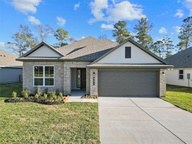 view of front of home with a garage and a front lawn