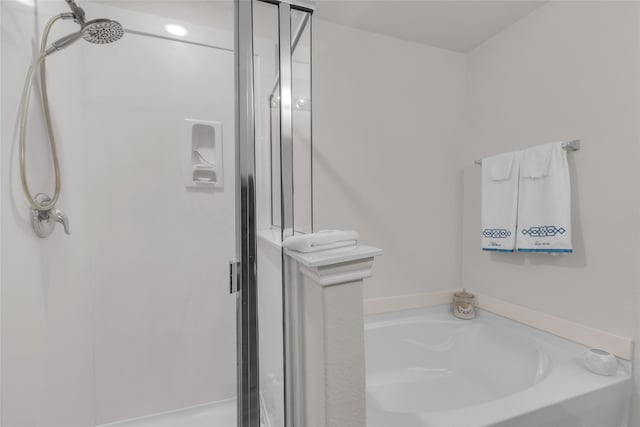 bathroom with independent shower and bath