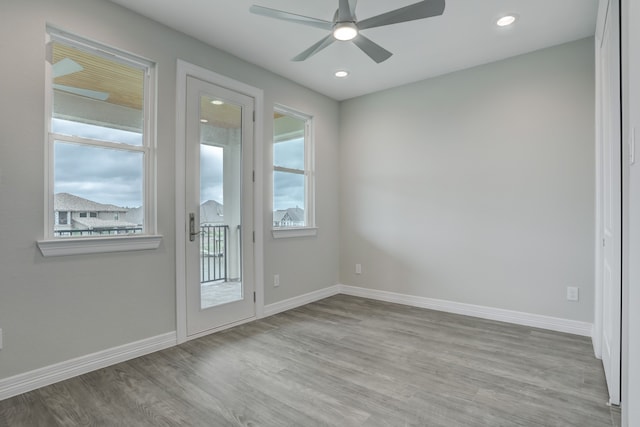 entryway featuring ceiling fan and light wood-type flooring