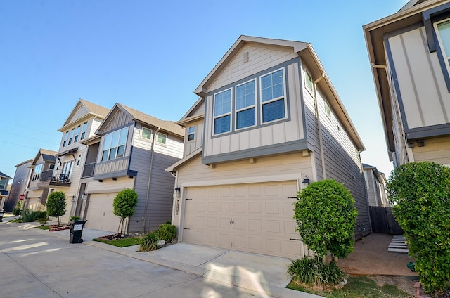 townhome / multi-family property featuring a garage