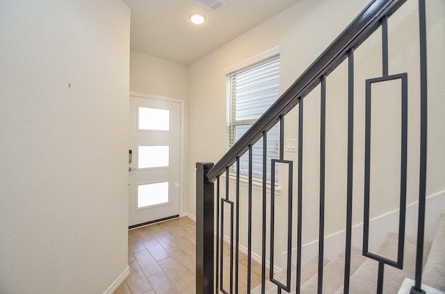 entrance foyer with hardwood / wood-style flooring